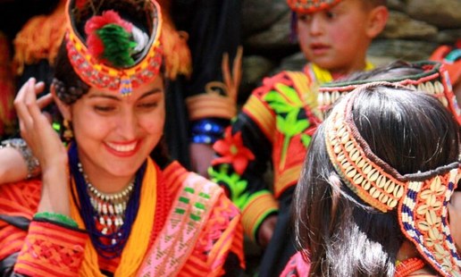 Traditional Kalash people celebrating a cultural festival in Chitral Pakistan